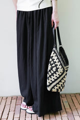 Pleated Wide-Leg Trousers